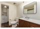 Clean bathroom with modern vanity and laundry area at 11596 W Sierra Dawn Blvd # 157, Surprise, AZ 85378