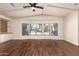 Living room featuring hardwood floors and expansive windows at 11596 W Sierra Dawn Blvd # 157, Surprise, AZ 85378