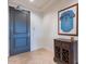Residential entryway with dark wood cabinet at 2211 E Camelback Rd # 505, Phoenix, AZ 85016