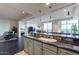 Gourmet kitchen with granite countertops and modern cabinetry at 2211 E Camelback Rd # 505, Phoenix, AZ 85016