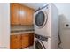 Convenient laundry room with stackable washer and dryer at 2211 E Camelback Rd # 505, Phoenix, AZ 85016