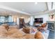 Spacious living room with leather furniture and fireplace at 2211 E Camelback Rd # 505, Phoenix, AZ 85016