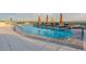 Relaxing rooftop pool with lounge chairs and umbrellas at 2211 E Camelback Rd # 505, Phoenix, AZ 85016