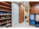 Custom walk-in closet with built-in shelving and storage at 2211 E Camelback Rd # 505, Phoenix, AZ 85016