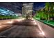 Night view of building exterior with well-lit walkway at 2211 E Camelback Rd # 505, Phoenix, AZ 85016