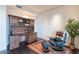 Home office with wood desk and leather chair at 2211 E Camelback Rd # 505, Phoenix, AZ 85016