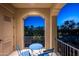 Private balcony with small table and chairs, offering scenic views at 9848 E Parkside Ln, Scottsdale, AZ 85255