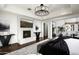 Luxurious main bedroom featuring a fireplace and ample natural light at 9848 E Parkside Ln, Scottsdale, AZ 85255