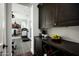 Home gym with treadmill and exercise equipment, plus a kitchenette at 9848 E Parkside Ln, Scottsdale, AZ 85255