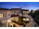 Luxury home exterior with multiple balconies and a grand staircase at 9848 E Parkside Ln, Scottsdale, AZ 85255