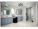 Bathroom with dual vanities, and plenty of storage space at 9848 E Parkside Ln, Scottsdale, AZ 85255