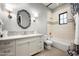 Spa-like bathroom with updated fixtures, a soaking tub, and a walk-in shower at 9848 E Parkside Ln, Scottsdale, AZ 85255