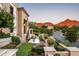 Luxury home exterior; landscaped grounds, mountain views, and gated entry at 9848 E Parkside Ln, Scottsdale, AZ 85255