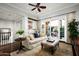 Relaxing sitting area with comfortable sofa and access to a private balcony at 9848 E Parkside Ln, Scottsdale, AZ 85255