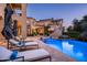 Expansive pool and spa area with lounge chairs at 9848 E Parkside Ln, Scottsdale, AZ 85255