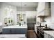 Spacious kitchen with stainless steel appliances and marble countertops at 9848 E Parkside Ln, Scottsdale, AZ 85255