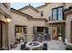 Courtyard with fire pit and built in bar at 9848 E Parkside Ln, Scottsdale, AZ 85255