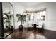 Elegant sitting area with large mirror and hardwood floors at 9848 E Parkside Ln, Scottsdale, AZ 85255