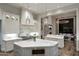 Large kitchen with island and stainless steel appliances at 9848 E Parkside Ln, Scottsdale, AZ 85255