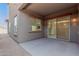 Covered patio with concrete flooring and sliding glass door at 8628 W Solano Dr, Glendale, AZ 85305