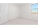 Bright bedroom with window and neutral walls at 8628 W Solano Dr, Glendale, AZ 85305