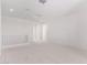 Spacious loft area with neutral carpeting and white walls at 8628 W Solano Dr, Glendale, AZ 85305