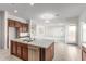 Open concept kitchen with large island and dishwasher at 8628 W Solano Dr, Glendale, AZ 85305