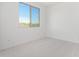 Well-lit bedroom with neutral walls and carpet, offering a cozy atmosphere at 8628 W Solano Dr, Glendale, AZ 85305