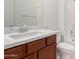 Clean bathroom with single sink vanity and toilet at 8628 W Solano Dr, Glendale, AZ 85305