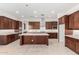 Modern kitchen with large island and ample cabinet space at 8628 W Solano Dr, Glendale, AZ 85305