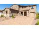 Two story home with a three car garage and pavers at 8628 W Solano Dr, Glendale, AZ 85305