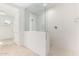 Large walk-in shower with glass enclosure and patterned tile at 8628 W Solano Dr, Glendale, AZ 85305