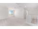Bright and airy loft with a window and carpeted floor at 8628 W Solano Dr, Glendale, AZ 85305