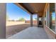 Covered patio with concrete flooring and view of backyard at 8628 W Solano Dr, Glendale, AZ 85305
