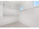 Spacious walk-in closet with ample shelving and hanging rods at 8628 W Solano Dr, Glendale, AZ 85305