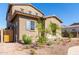 Two-story house with a landscaped yard and wooden gate at 8628 W Solano Dr, Glendale, AZ 85305