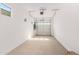 Large garage with overhead door and windows at 8628 W Solano Dr, Glendale, AZ 85305