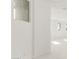 Bright hallway with neutral walls and carpet flooring at 8628 W Solano Dr, Glendale, AZ 85305