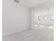 Open and airy bedroom with access to another bedroom and natural light at 8628 W Solano Dr, Glendale, AZ 85305