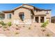 Two story home with stone accents and landscaping at 8628 W Solano Dr, Glendale, AZ 85305