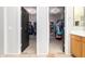 Large walk-in closet with ample shelving and hanging space at 3702 W Riordan Ranch Rd, Phoenix, AZ 85083