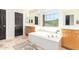 Bathroom with a large soaking tub and double sinks at 3702 W Riordan Ranch Rd, Phoenix, AZ 85083