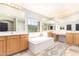 Large bathroom with double vanities, soaking tub, and a view at 3702 W Riordan Ranch Rd, Phoenix, AZ 85083
