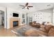 Living room features a cozy fireplace and comfortable seating at 3702 W Riordan Ranch Rd, Phoenix, AZ 85083