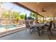 Covered patio with dining area and pool view at 3702 W Riordan Ranch Rd, Phoenix, AZ 85083