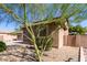 House exterior with desert landscaping and a tree in the front yard at 3702 W Riordan Ranch Rd, Phoenix, AZ 85083