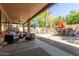 Outdoor patio features seating area and views of the pool at 3702 W Riordan Ranch Rd, Phoenix, AZ 85083