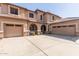 Two-story house with a three-car garage and a large driveway at 3702 W Riordan Ranch Rd, Phoenix, AZ 85083