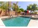 Inviting swimming pool with surrounding landscaping at 3702 W Riordan Ranch Rd, Phoenix, AZ 85083