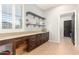 Home office with built-in shelving and ample counter space at 3702 W Riordan Ranch Rd, Phoenix, AZ 85083